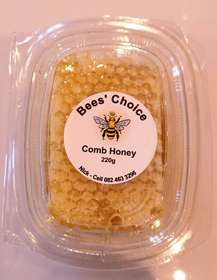 A 220g punnet of Bees' Choice comb honey